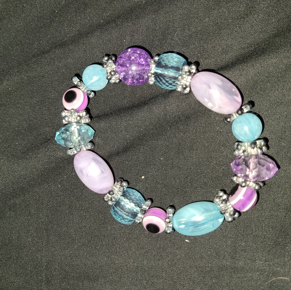 Blue and purple beaded brush